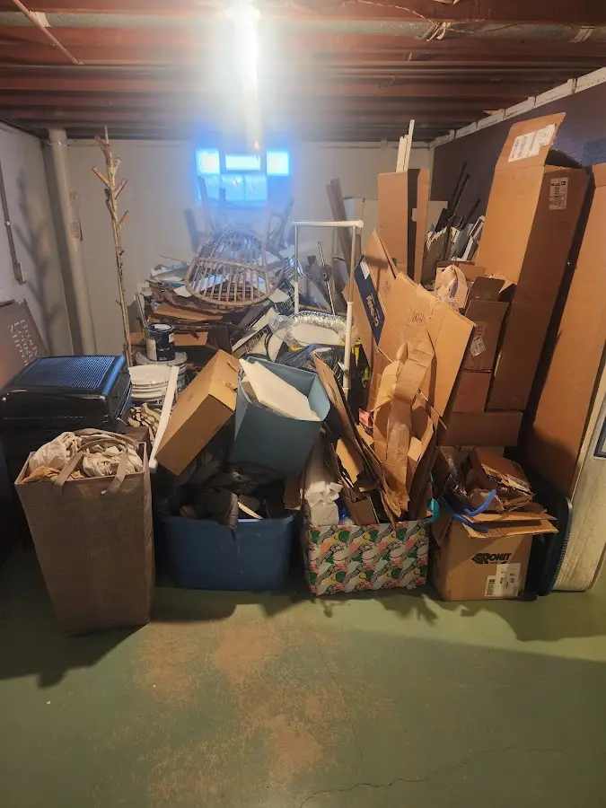 Roll-off dumpster container at job site for 2 Yard Dumpster Rental in James City